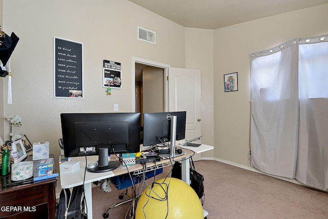 home office with carpet floors and baseboards