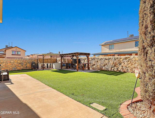 view of yard with a pergola, a patio area, and a hot tub