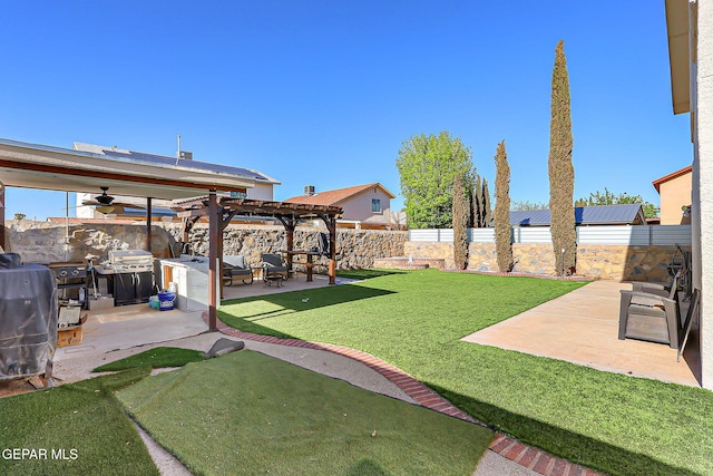 view of yard featuring a pergola, a patio, and a ceiling fan