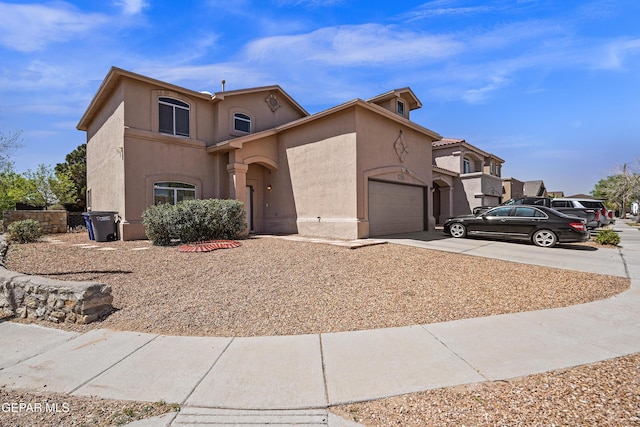 3501 Al Roberts Dr, El Paso, TX 79936 - view of front facade featuring concrete driveway, stucco siding, and an attached garage
