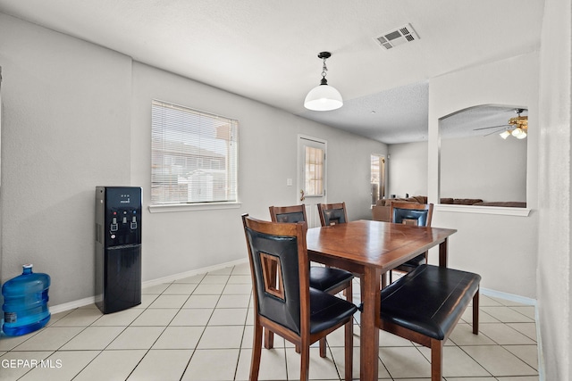 3501 Al Roberts Dr, El Paso, TX 79936 - dining area with light tile patterned floors, visible vents, baseboards, and ceiling fan
