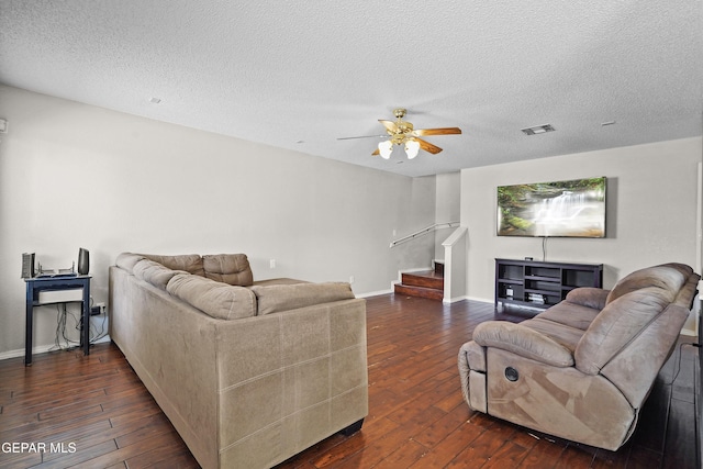 3501 Al Roberts Dr, El Paso, TX 79936 - living area with ceiling fan, visible vents, stairway, baseboards, and dark wood-style floors