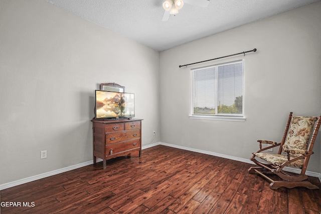 3501 Al Roberts Dr, El Paso, TX 79936 - sitting room featuring baseboards, a ceiling fan, wood finished floors, and a textured ceiling