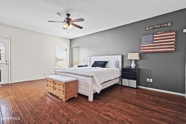 3501 Al Roberts Dr, El Paso, TX 79936 - bedroom with a textured ceiling, wood finished floors, ceiling fan, and baseboards
