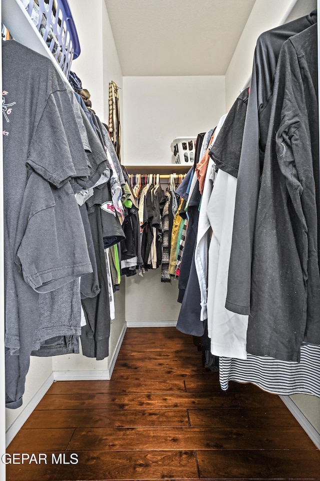 3501 Al Roberts Dr, El Paso, TX 79936 - walk in closet featuring hardwood / wood-style floors