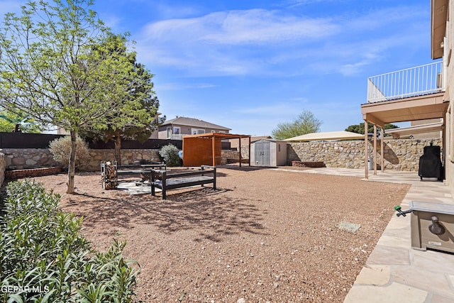 3501 Al Roberts Dr, El Paso, TX 79936 - view of yard with an outbuilding, a shed, a fenced backyard, and a patio area