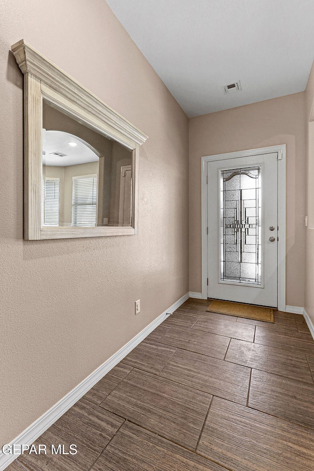 14439 Eastbrook Dr, El Paso, TX 79938 - doorway with visible vents and baseboards
