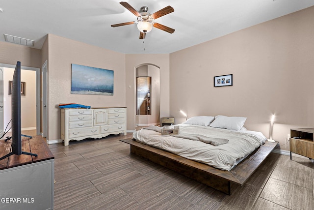 14439 Eastbrook Dr, El Paso, TX 79938 - bedroom featuring arched walkways, visible vents, baseboards, and ceiling fan