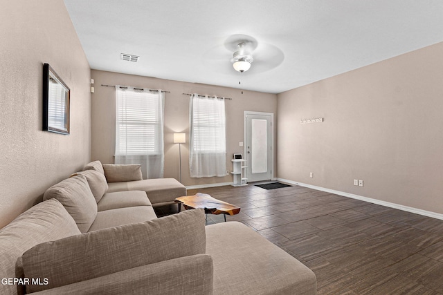 14439 Eastbrook Dr, El Paso, TX 79938 - living area featuring visible vents, ceiling fan, wood finished floors, and baseboards