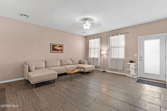 14439 Eastbrook Dr, El Paso, TX 79938 - living area with visible vents, baseboards, wood finish floors, and ceiling fan