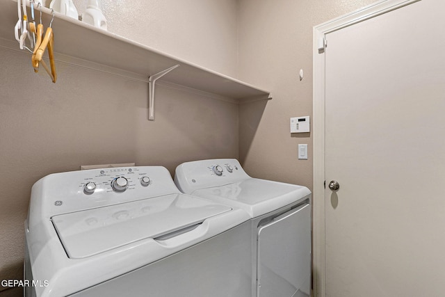 14439 Eastbrook Dr, El Paso, TX 79938 - laundry area featuring washer and dryer and laundry area