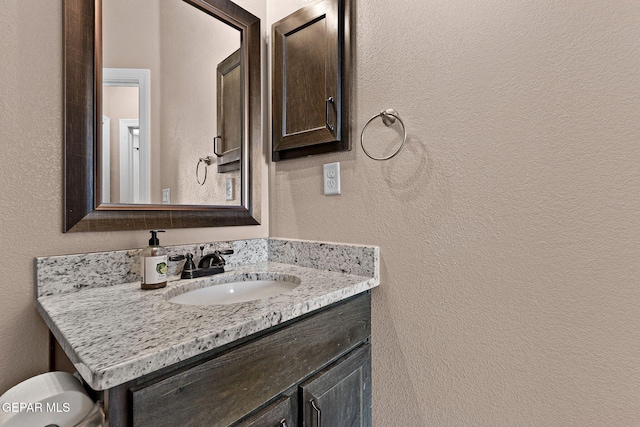 14439 Eastbrook Dr, El Paso, TX 79938 - bathroom featuring vanity and a textured wall