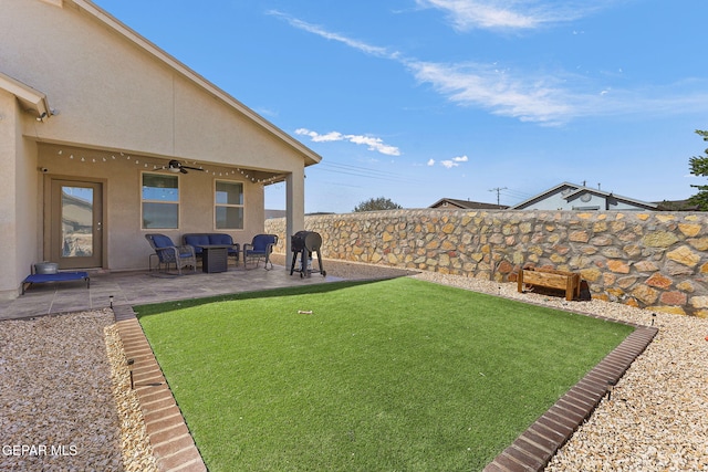 14439 Eastbrook Dr, El Paso, TX 79938 - view of yard featuring a patio, a fenced backyard, and a ceiling fan