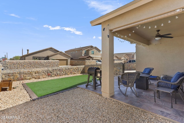 14439 Eastbrook Dr, El Paso, TX 79938 - view of patio with ceiling fan, fence, and a residential view