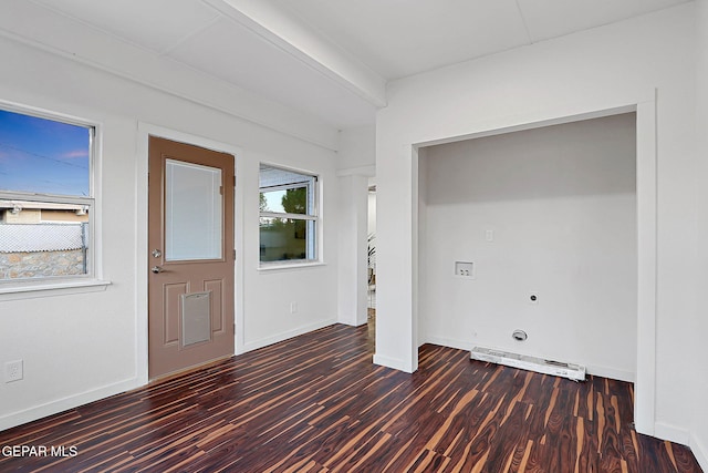 foyer entrance with visible vents, baseboards, and wood finished floors