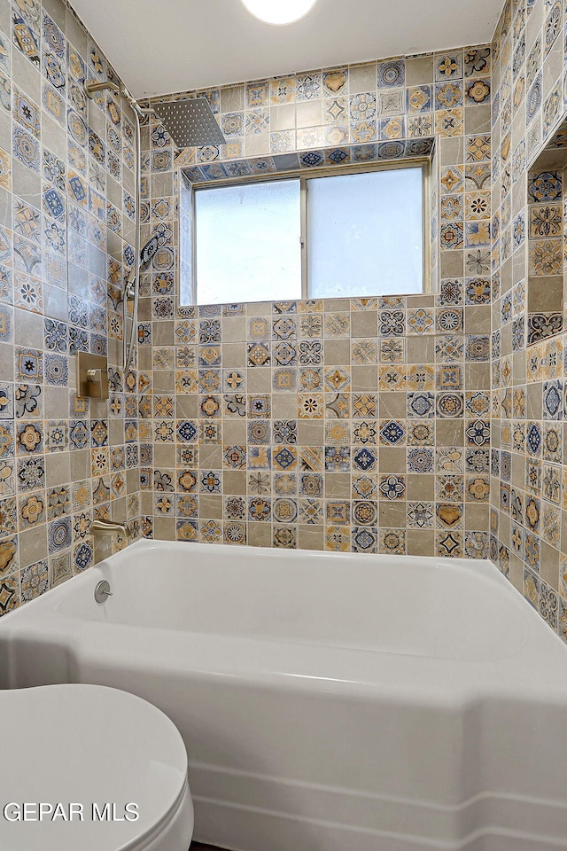 bathroom featuring toilet