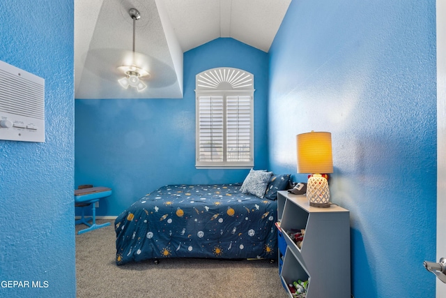 400 Rio Fango, El Paso, TX 79932 - carpeted bedroom featuring a textured wall, baseboards, and lofted ceiling