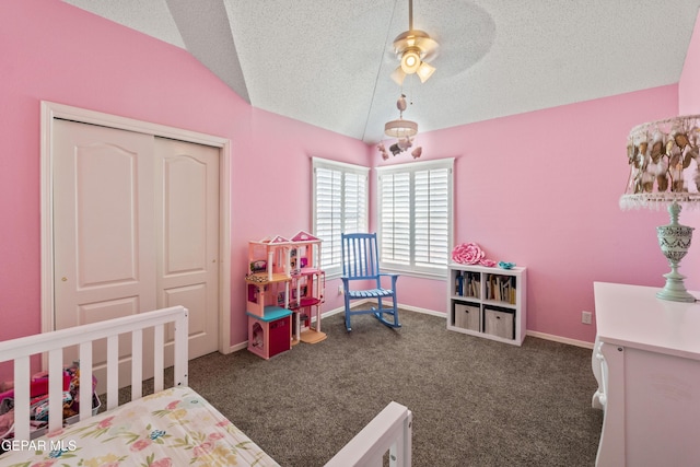 400 Rio Fango, El Paso, TX 79932 - carpeted bedroom with a closet, baseboards, a textured ceiling, and vaulted ceiling