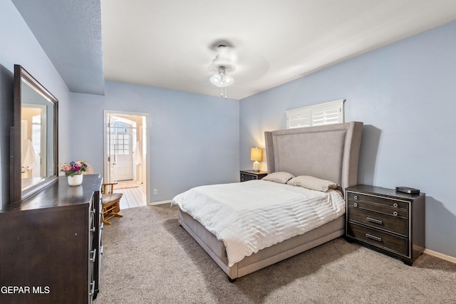 400 Rio Fango, El Paso, TX 79932 - bedroom with ensuite bathroom, baseboards, and carpet floors