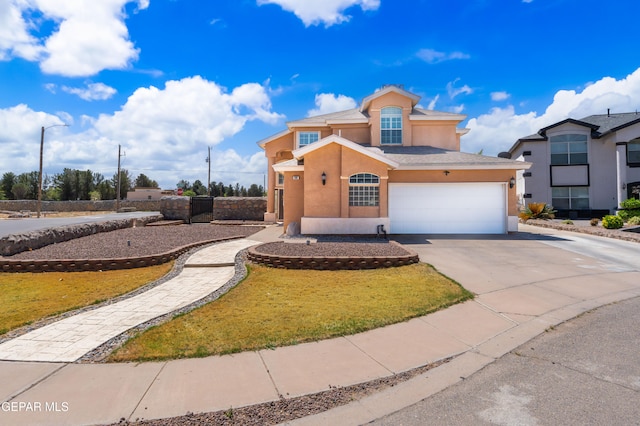400 Rio Fango, El Paso, TX 79932 - view of front facade featuring driveway, stucco siding, and a front lawn
