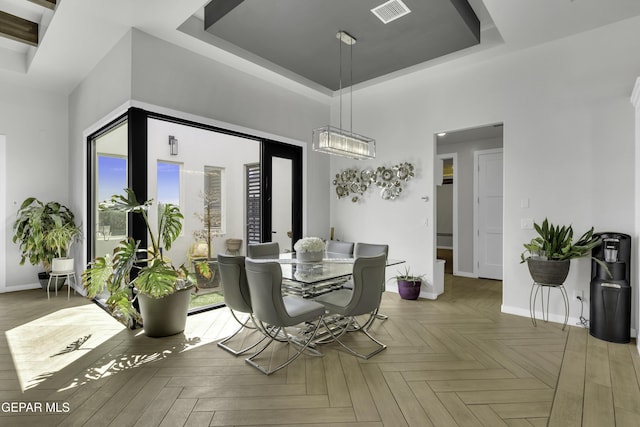 784 Brunswick Pl, Horizon City, TX 79928 - dining area featuring visible vents, baseboards, and a raised ceiling