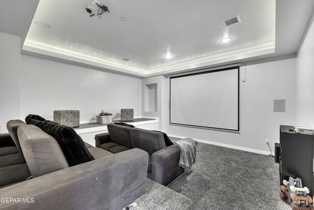 784 Brunswick Pl, Horizon City, TX 79928 - carpeted home theater room with a tray ceiling, baseboards, recessed lighting, and visible vents