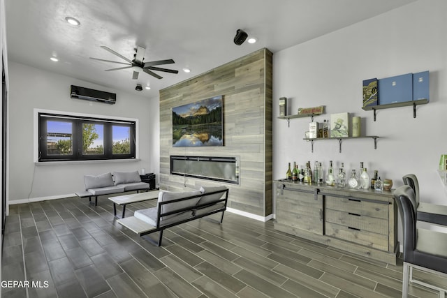 784 Brunswick Pl, Horizon City, TX 79928 - living room with baseboards, recessed lighting, dark wood-style floors, a ceiling fan, and a tile fireplace