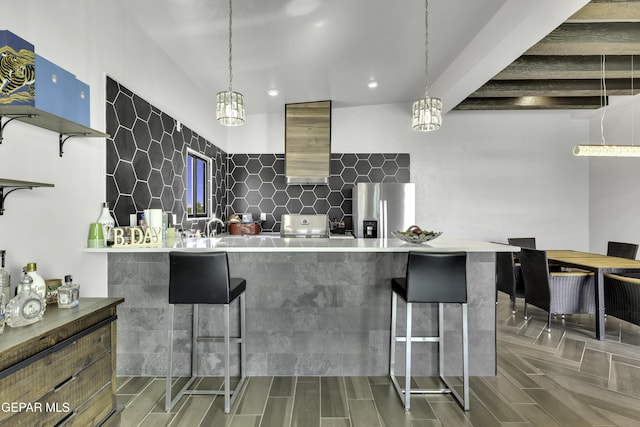 784 Brunswick Pl, Horizon City, TX 79928 - kitchen with modern cabinets, tasteful backsplash, open shelves, a breakfast bar, and stainless steel fridge