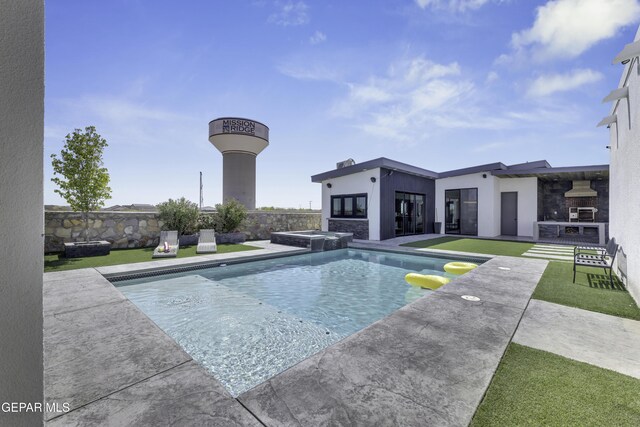 784 Brunswick Pl, Horizon City, TX 79928 - view of swimming pool featuring a patio area, a pool with connected hot tub, fence, and a lawn