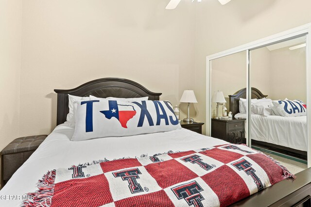 bedroom with a closet and a ceiling fan
