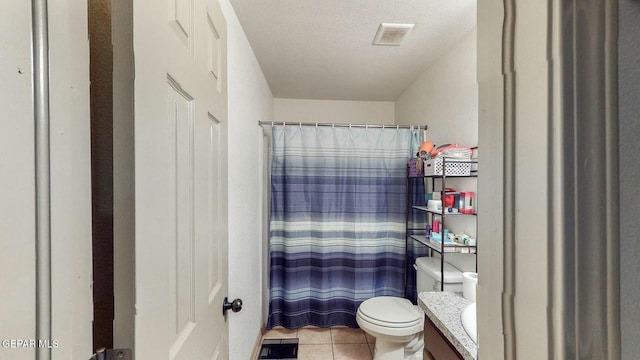 full bath featuring visible vents, curtained shower, toilet, vanity, and tile patterned floors
