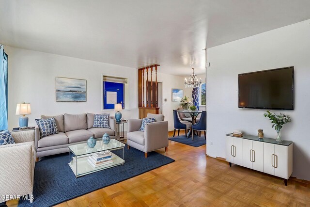 living room with a chandelier