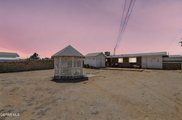 view of yard featuring a gazebo and cooling unit
