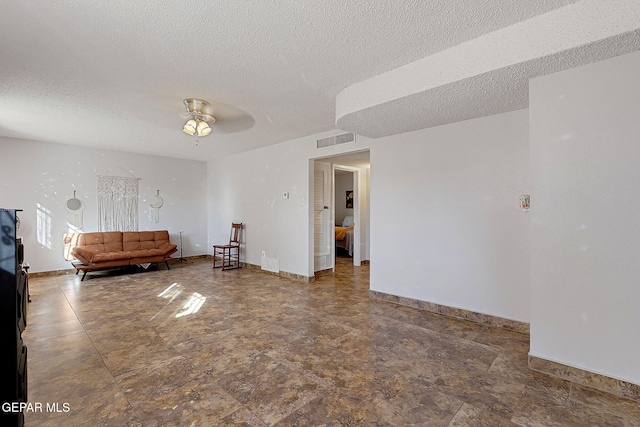 3705 Roslyn Dr, Horizon City, TX 79928 - living room featuring ceiling fan, a textured ceiling, baseboards, and visible vents