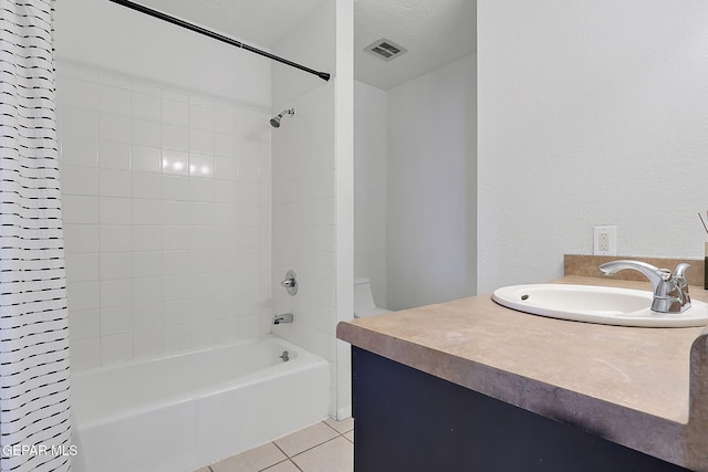 3705 Roslyn Dr, Horizon City, TX 79928 - full bathroom featuring vanity, shower / tub combination, visible vents, and tile patterned floors