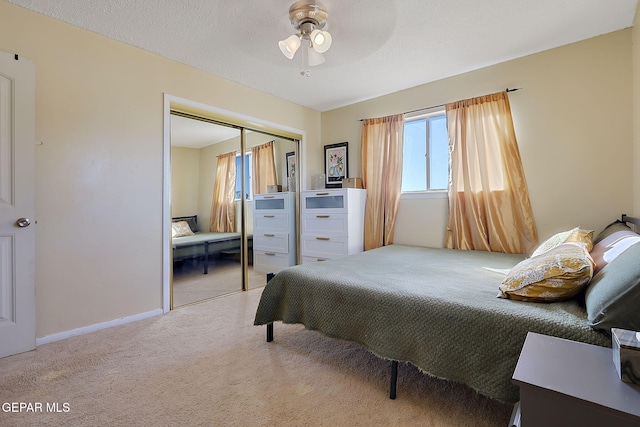 3705 Roslyn Dr, Horizon City, TX 79928 - carpeted bedroom with a closet, a ceiling fan, and baseboards