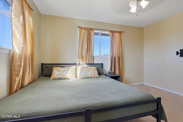 3705 Roslyn Dr, Horizon City, TX 79928 - bedroom featuring baseboards, a ceiling fan, and carpet floors