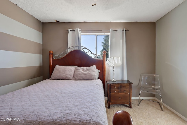 3705 Roslyn Dr, Horizon City, TX 79928 - bedroom with light carpet, a textured ceiling, and baseboards