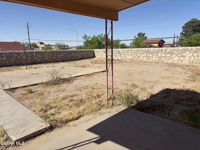 1604 Rick Rhodes Dr, El Paso, TX 79936 - view of yard featuring a patio area and a fenced backyard