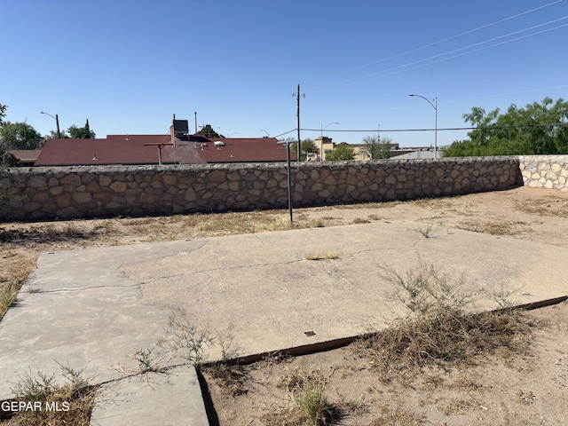 1604 Rick Rhodes Dr, El Paso, TX 79936 - view of yard featuring fence