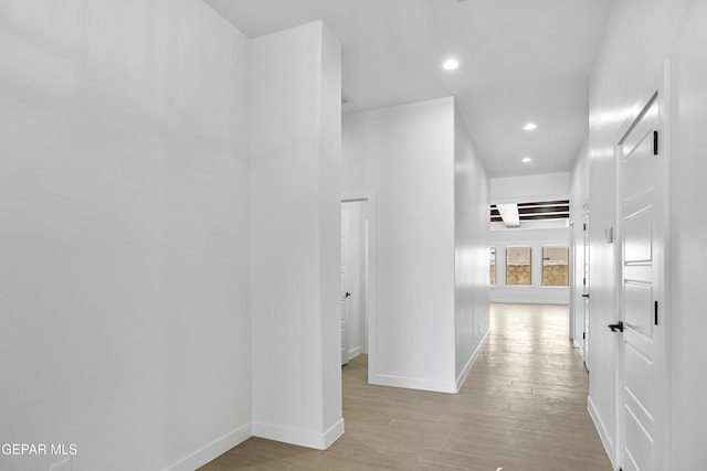 3792 Surmise St, El Paso, TX 79938 - corridor featuring baseboards, wood finished floors, and recessed lighting
