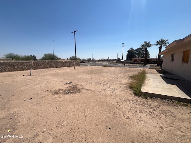 view of yard with a patio area and fence