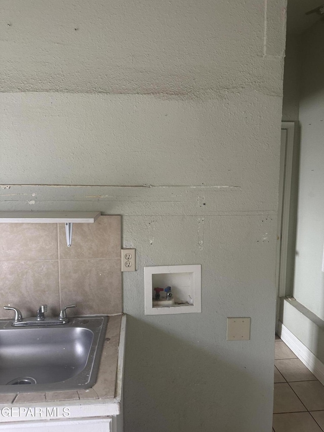 3506 Pera Ave Unit A & B, El Paso, TX 79905 - laundry view of a sink and backsplash