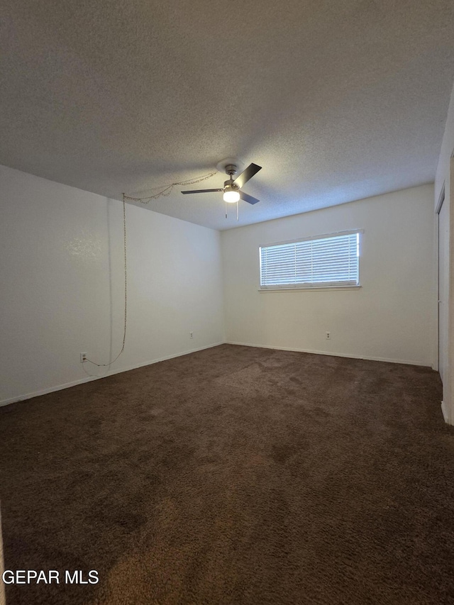 425 Irondale Dr Unit E, El Paso, TX 79912 - carpeted spare room with ceiling fan and a textured ceiling