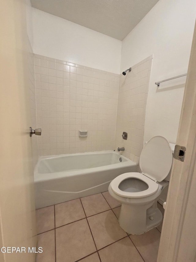 425 Irondale Dr Unit E, El Paso, TX 79912 - bathroom with tile patterned floors, toilet, and shower / tub combination