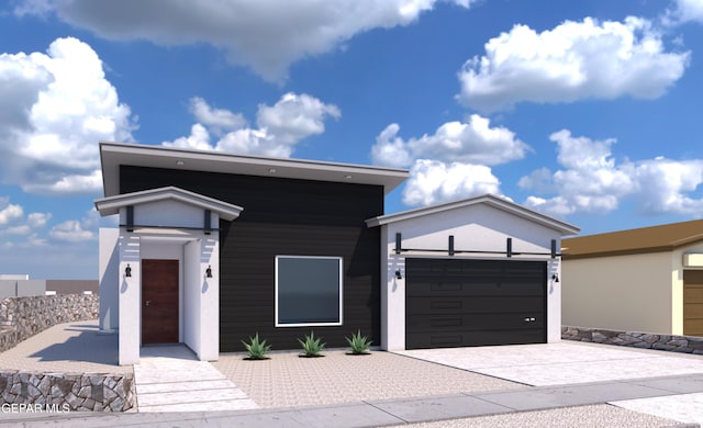 1413 Dylan Pl, El Paso, TX 79928 - view of front facade with a garage, stucco siding, and driveway