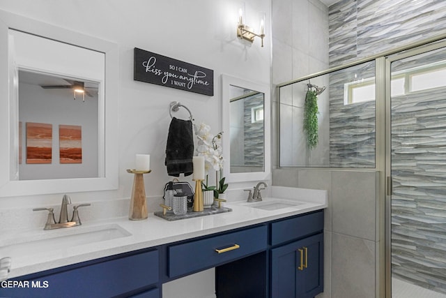 157 Bonnie Trl, Santa Teresa, NM 88008 - full bathroom with double vanity, a stall shower, and ceiling fan