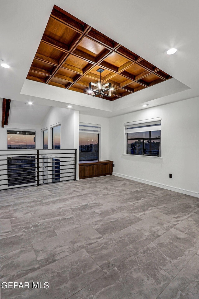 4108 Metetuye Ln, El Paso, TX 79902 - unfurnished living room featuring baseboards, wooden ceiling, beamed ceiling, recessed lighting, and coffered ceiling
