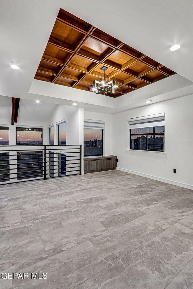 4108 Metetuye Ln, El Paso, TX 79902 - unfurnished living room featuring coffered ceiling, beamed ceiling, baseboards, and recessed lighting