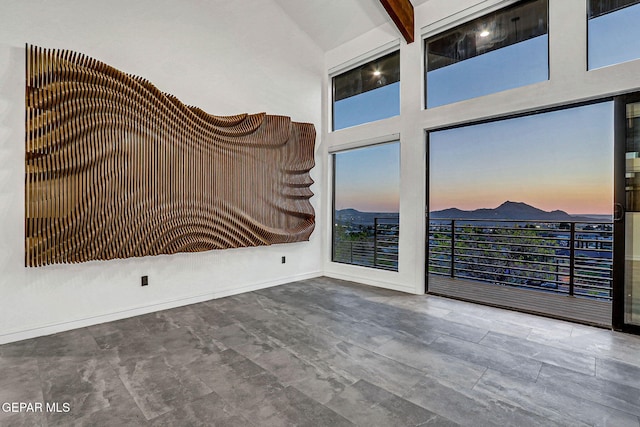 4108 Metetuye Ln, El Paso, TX 79902 - empty room with a high ceiling and baseboards